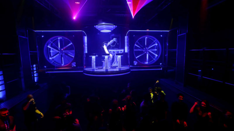 A robotic DJ plays music in Karlovy Lazne Music Club in Prague, Czech Republic