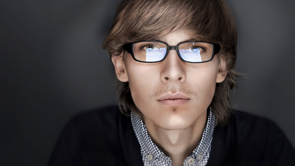 Portrait of young tech startup man with smart and wise look.